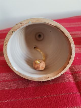 Due bambole in ceramica dipinte a mano