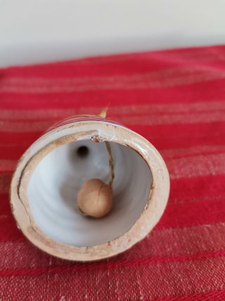 Due bambole in ceramica dipinte a mano