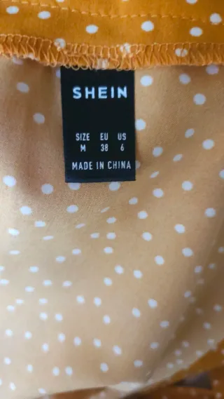 Falda asimétrica amarilla lunares