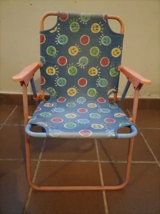Silla infantil plegable con caritas sonrientes