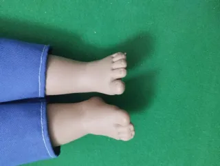 Muñeco antiguo niño vestido