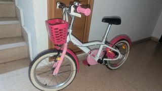 Bicicleta infantil rosa y blanca