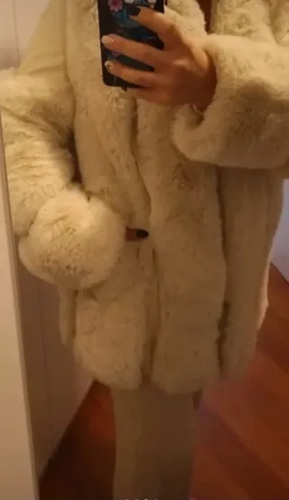 Pelliccia ecologica bianca taglia M