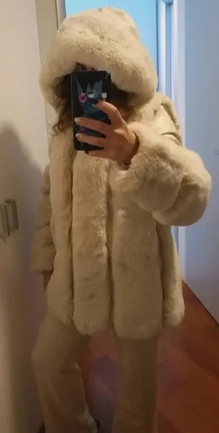 Pelliccia ecologica bianca taglia M