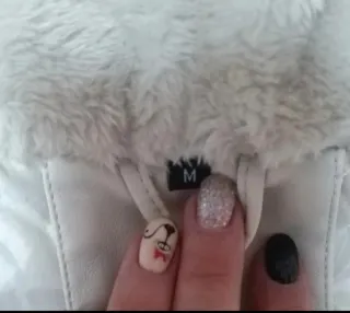 Pelliccia ecologica bianca taglia M