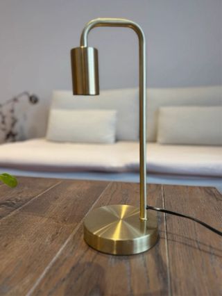 Lámpara de mesa dorada Zara Home