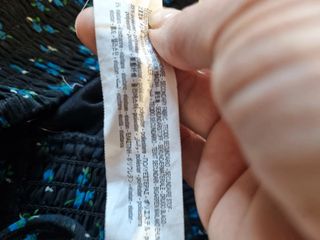 T XS Minifalda negra flores azul