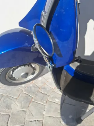 Suplemento espejo Vespa