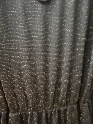 Mono fiesta negro con detalles dorados