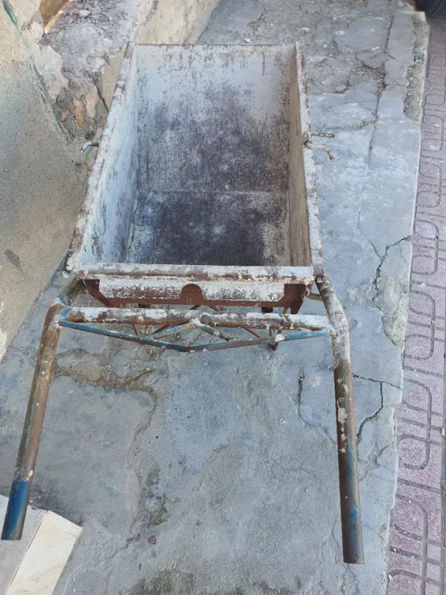 Carretilla de obra metálica