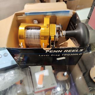 Carrete Penn Torque 300LD", "Fabricado en USA", "C