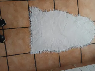 Alfombra de lana blanca