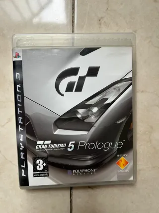 PS3 con 2 mandos y 5 juegos