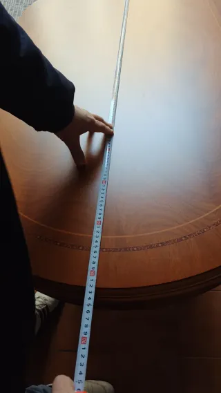 Mesa de comedor extensible ovalada de madera