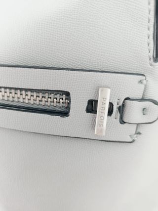 Mochila pequeña gris sin estrenar