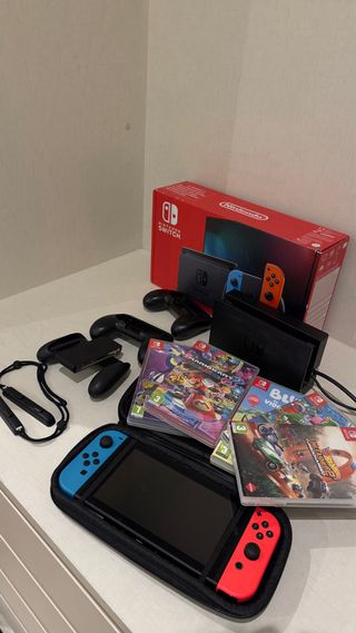 Nintendo Switch con 4 giochi