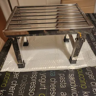 Banquito metálico plegable