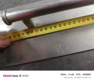 Colgador de metal plateado