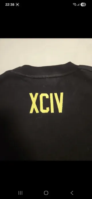 T-shirt GCDS nera con maniche gialle