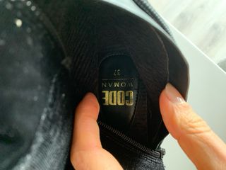 Botas pretas de cano alto