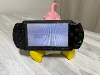 PSP 2004 Negra+PSP fat Tarjeta 64gb y con cargador