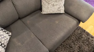 Sofá grande gris de tela