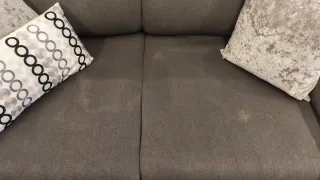 Sofá grande gris de tela