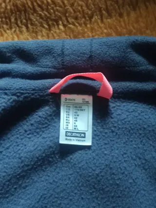 Chaqueta polar Tribord azul y rosa