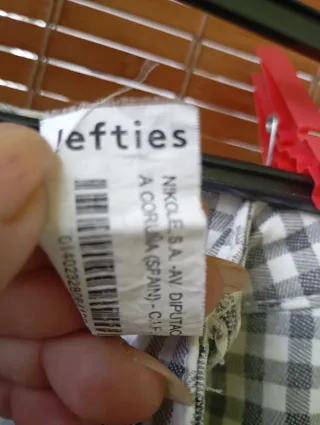 Pantalón cuadros mujer gris y blanco