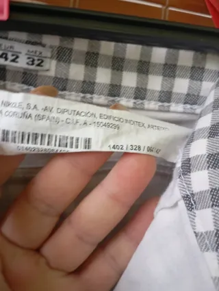 Pantalón cuadros mujer gris y blanco