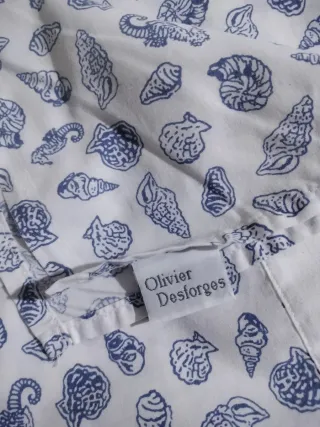 Tela con estampado de conchas marinas