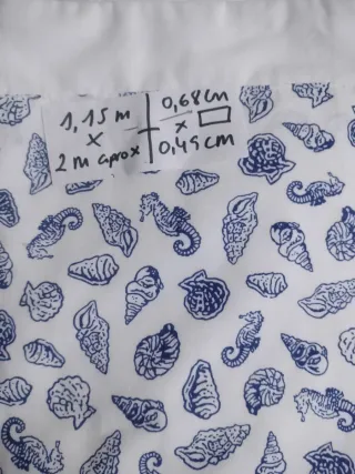 Tela con estampado de conchas marinas