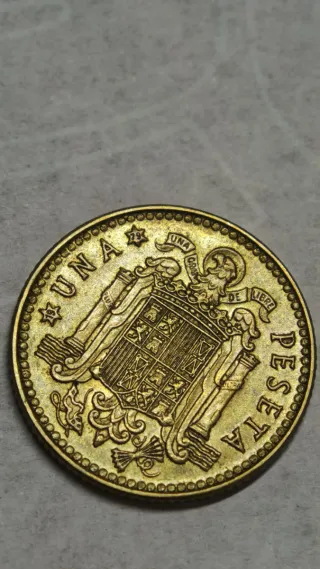 Moneda de 1 Peseta, número de la estrella 79.