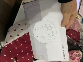 Massaggiatore schiena e collo grigio