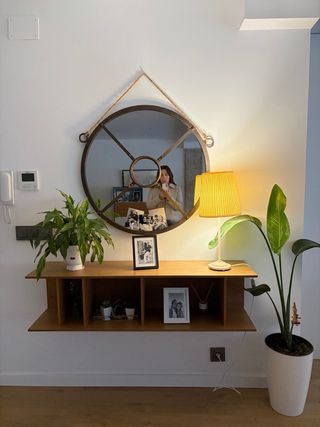 Specchio rotondo per ingresso in metallo e legno