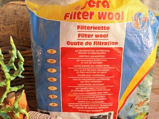 Accesorios para acuario: red y decoración