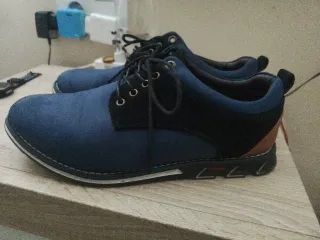 Zapatos elegantes azules y negros