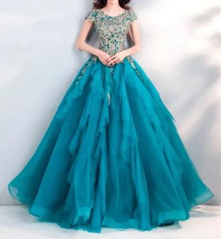 Vestido de fiesta largo dorado y turquesa