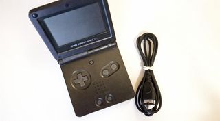 Game Boy Advance SP Negra para reparar + juego
