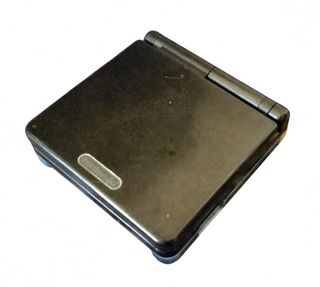 Game Boy Advance SP Negra para reparar + juego