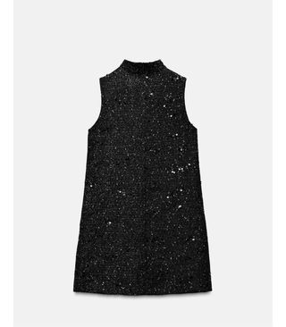 Vestido negro con pedrería y brillos