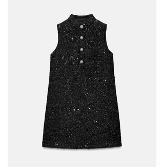 Vestido negro con pedrería y brillos