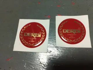 Emblema Derbi antorcha del Mundo