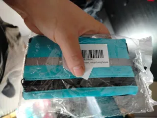 Riñonera deportiva running turquesa