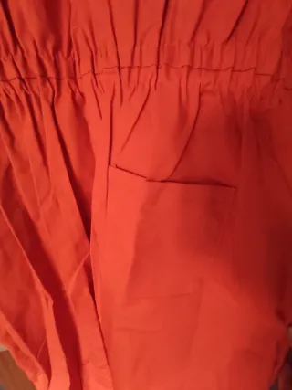 Peto naranja de trabajo