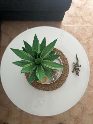 Mesa auxiliar redonda cristal y metal