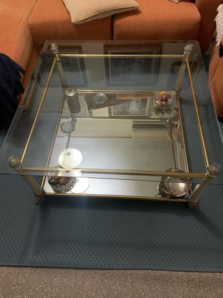 Mesa de centro cristal y metal dorado