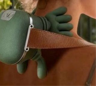 Masajeador eléctrico verde sin usar