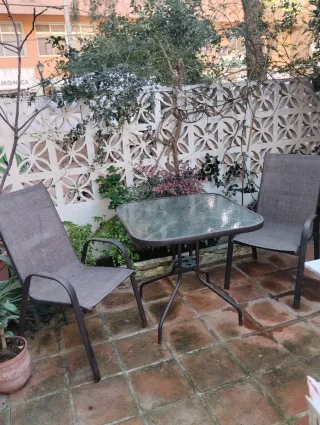 Mesa cristal y metal terraza