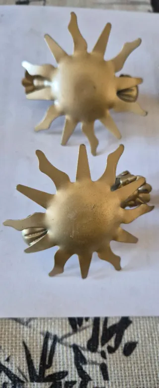 Ganci fermatende a forma di sole